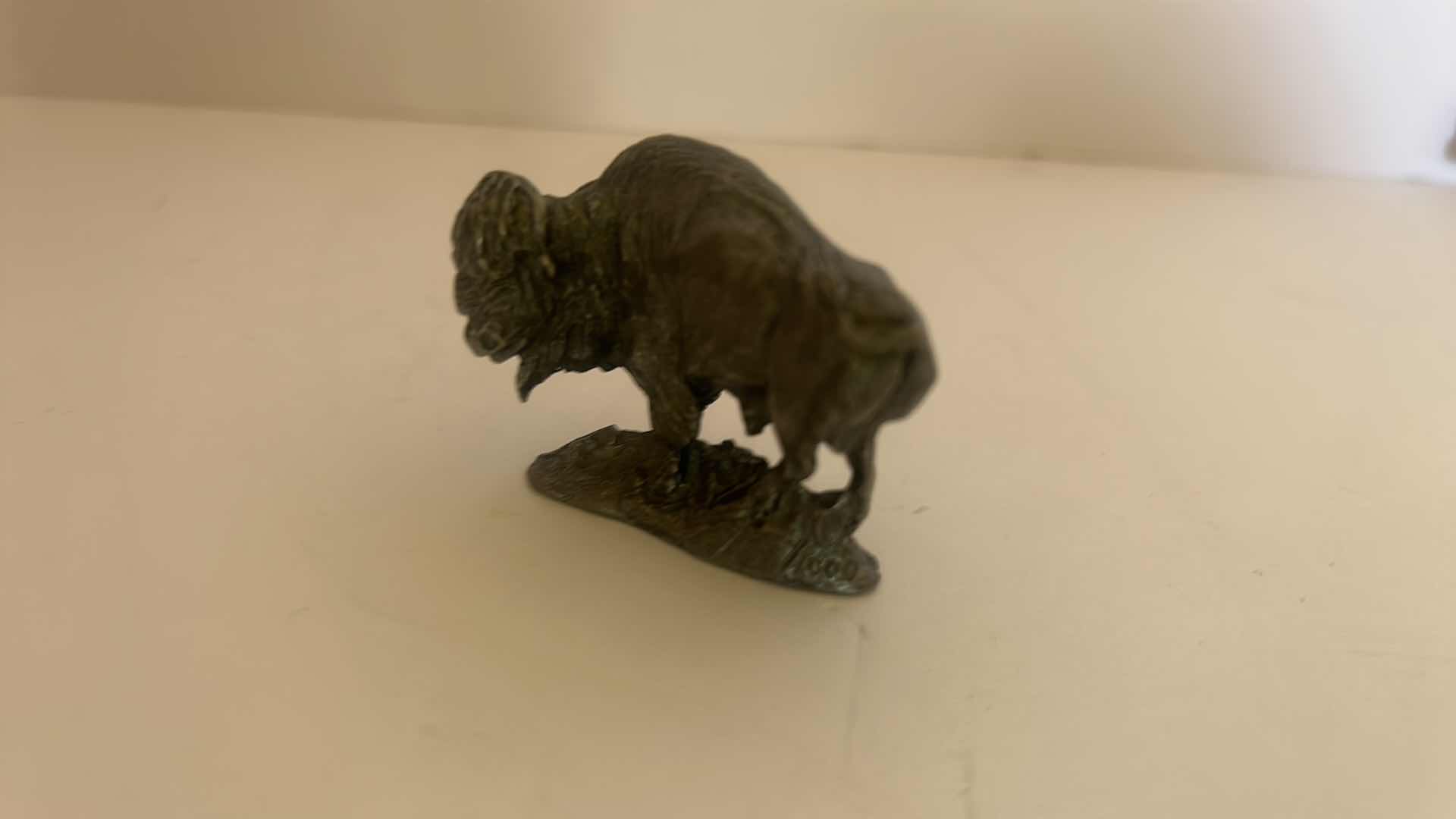 Photo 1 of INDIAN POTTERY FIGURE AND MINI PEWTER BUFFALO