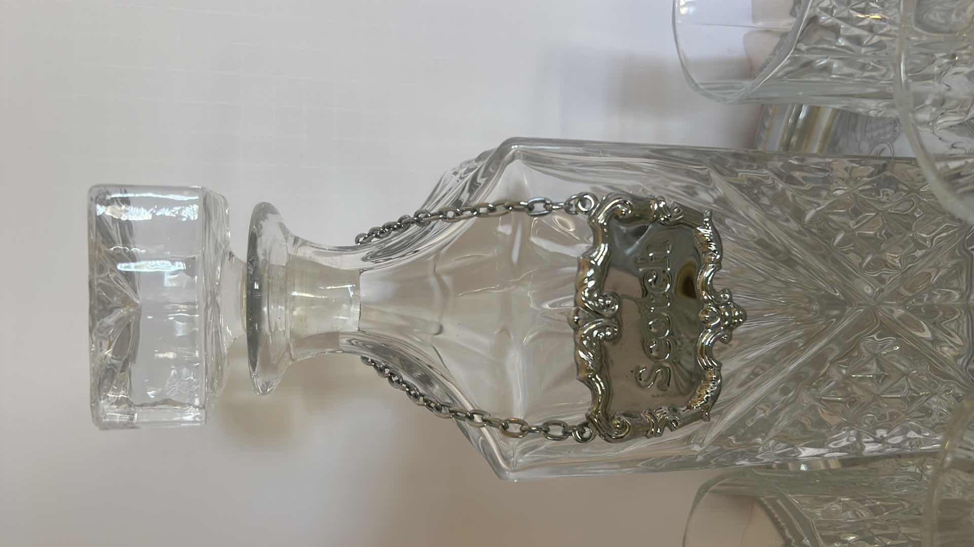 Photo 1 of CRYSTAL DECANTER ABD 4 CRYSTAL GLASSES WITH SILVER TRAY AND SCOTCH LABEL