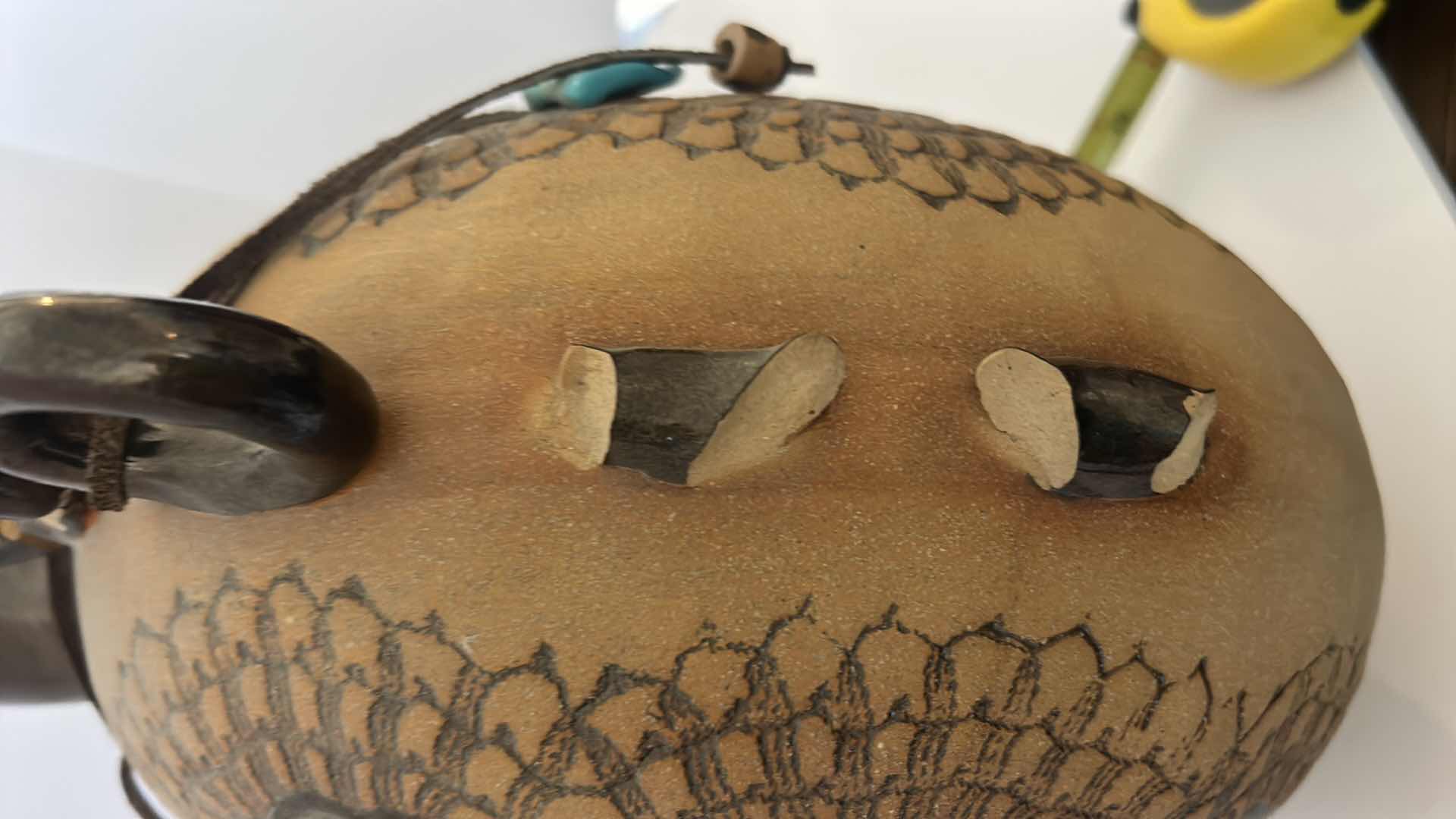 Photo 9 of SIGNED INDIAN ART POTTERY VESSEL WITH TURQUOISE STONED AND FUR 11 and half inches by 14 inches