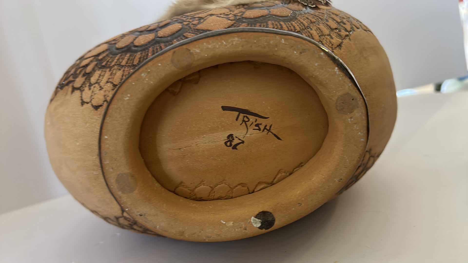 Photo 7 of SIGNED INDIAN ART POTTERY VESSEL WITH TURQUOISE STONED AND FUR 11 and half inches by 14 inches