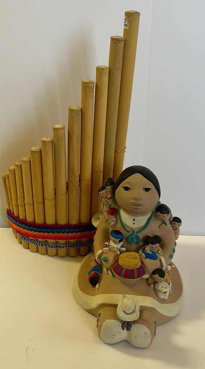 Photo 1 of SIGNED INDIAN FIGURINE AND PERUVIAN FLUTE