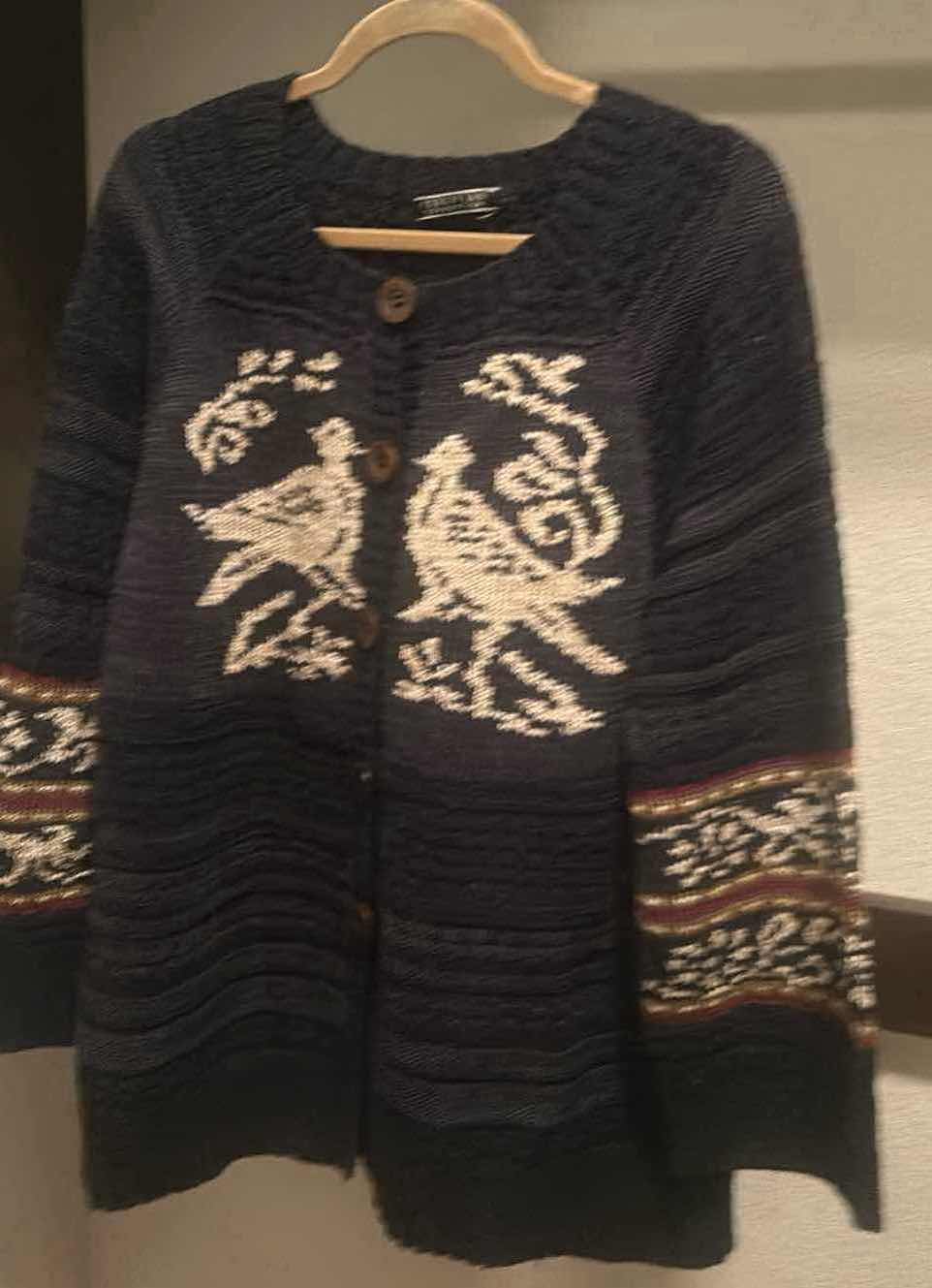 Photo 1 of WOMAN’S PERUVIAN CONNECTION SWEATER, SIZE XL.