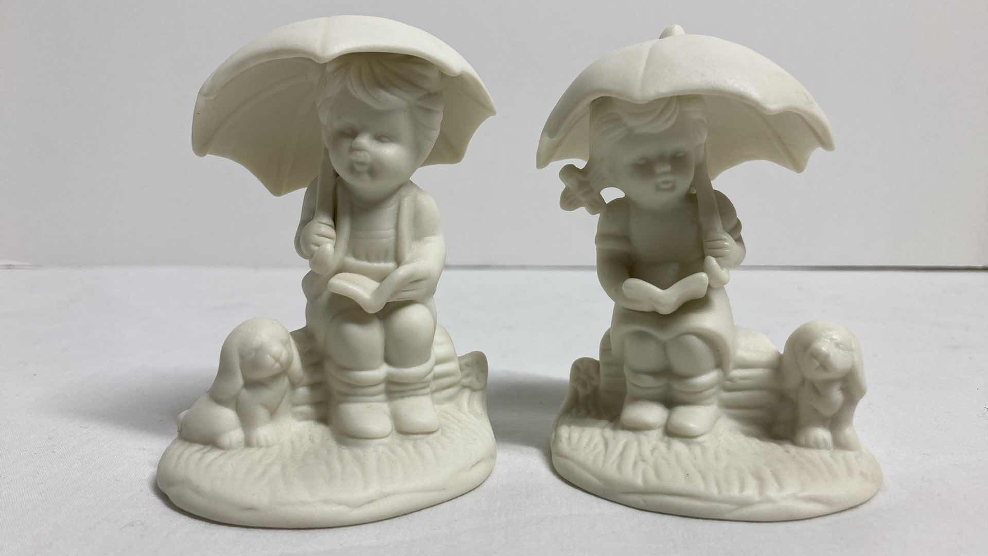 Photo 1 of JADE COLLECTION CERAMIC BOY & CERAMIC GIRL W UMBRELLA H3.5”