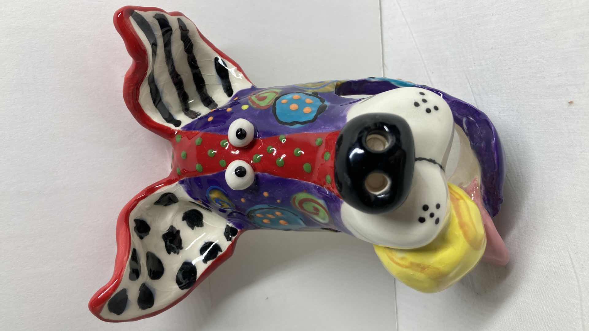 Photo 1 of ABSTRACT MULTI COLOR CERAMIC DOG MASK BALL 11/04 BY DOTTIE DRACOS 5” X 6.75”