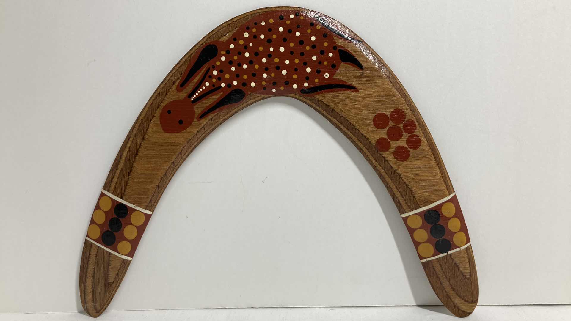 Photo 1 of WOODEN HAND PAINTED BOOMERANG BY CORRINE J. ARCHER 1999 12.75” X 9.75”
