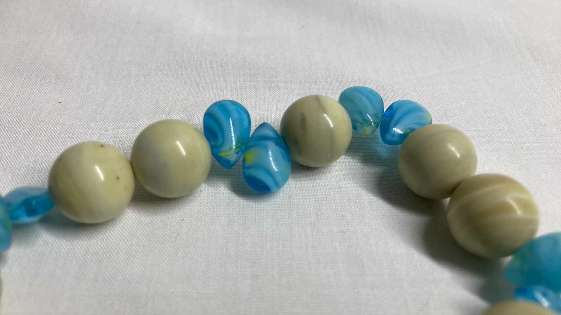 Photo 2 of NATURAL STONE & TEAL TEARDROP BEAD BRACELET 4”