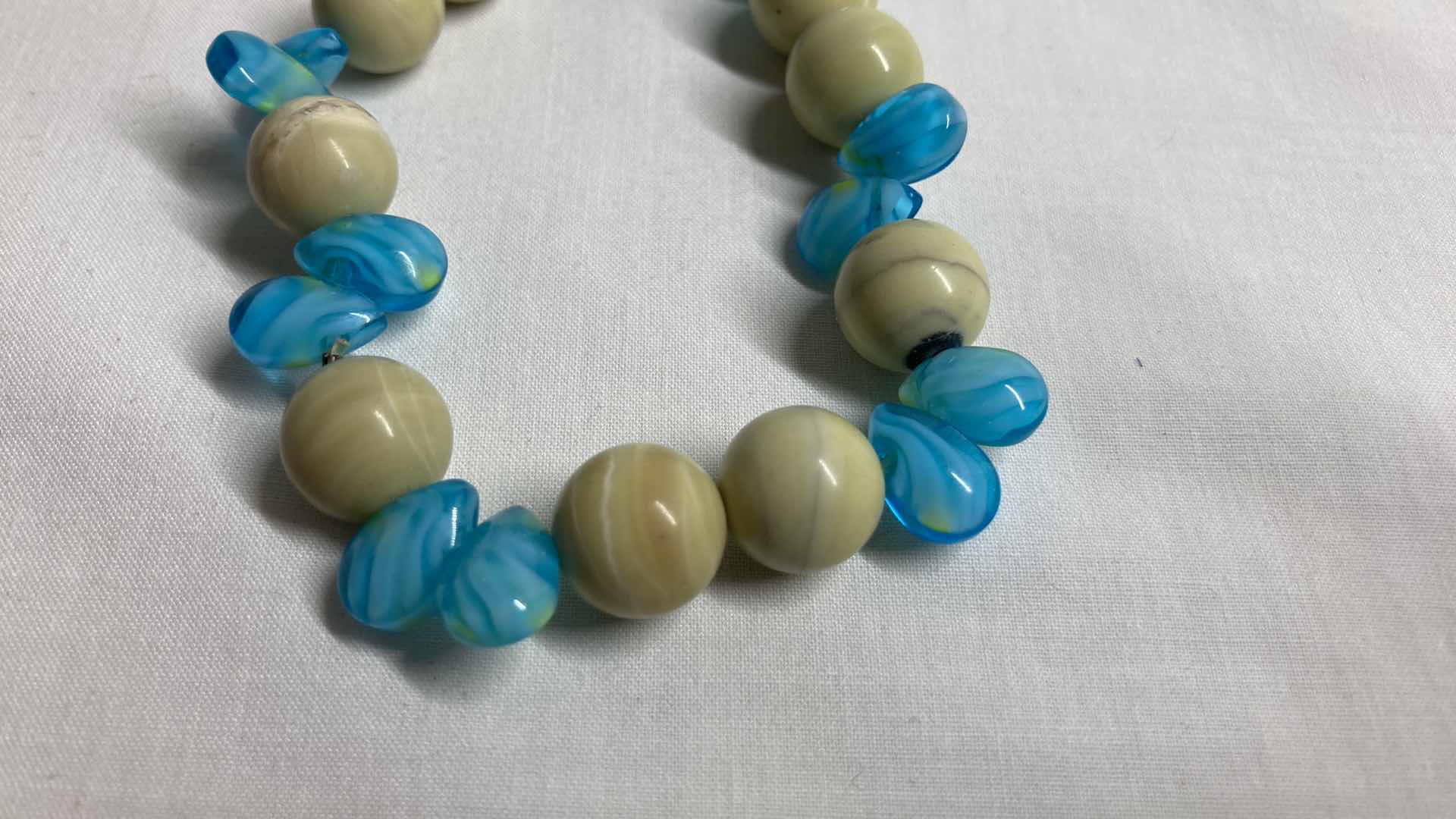 Photo 3 of NATURAL STONE & TEAL TEARDROP BEAD BRACELET 4”