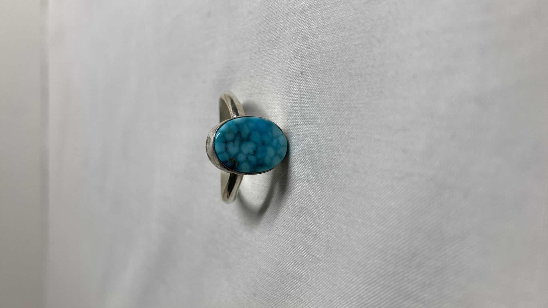 Photo 1 of TURQUOISE STONE & SILVER PLATED RING SIZE 9/10
