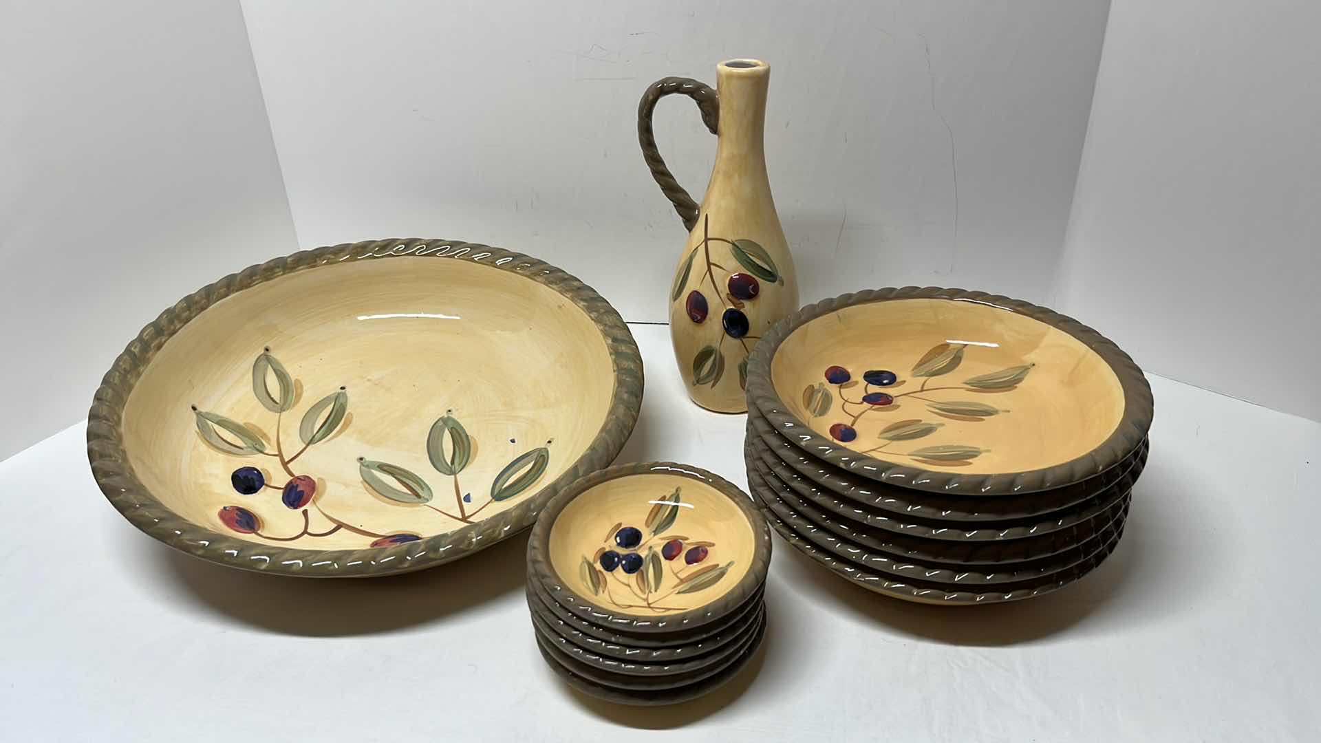 Photo 1 of GIBSON HOUSEWARES 14 PC HAND-PAINTED DISH WARE SET