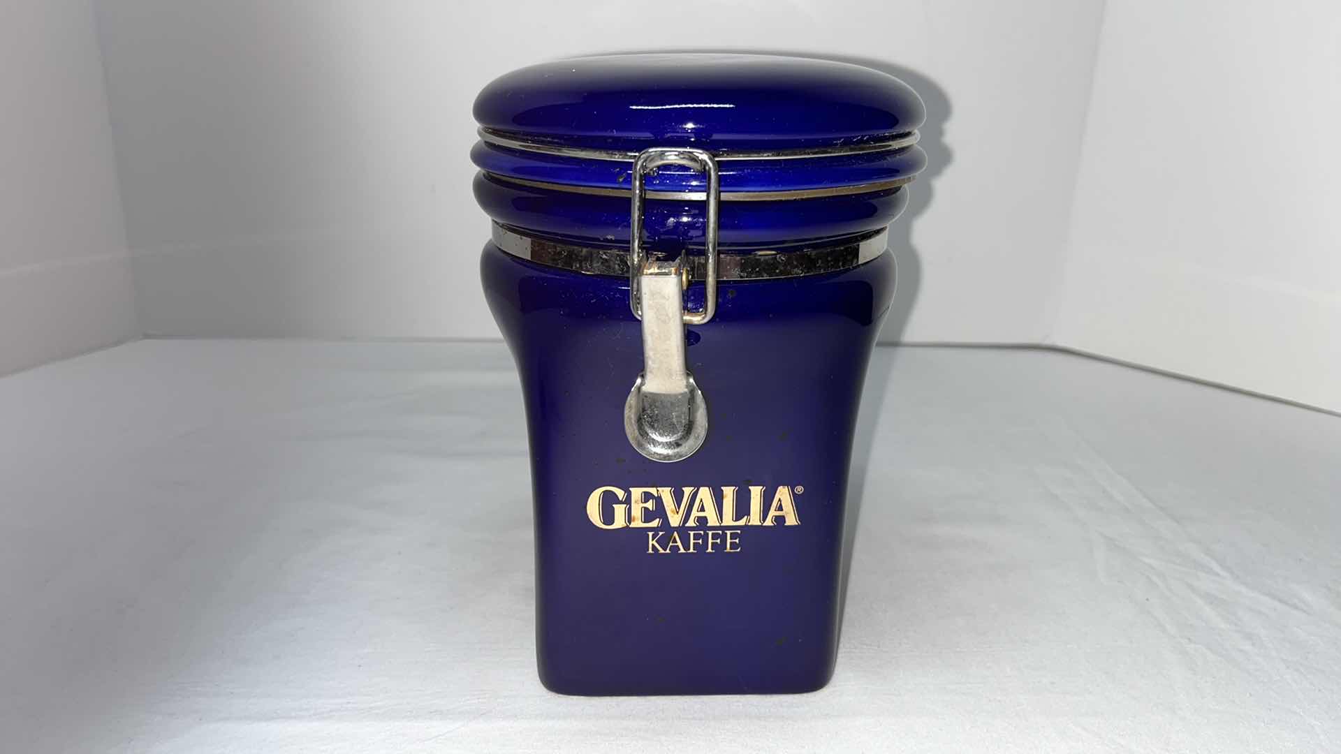 Photo 2 of GEVALIA KAFFE CERAMIC 7.75” FLIP TOP CANISTER W 2 COBALT BLUE 6” COFFEE CUPS