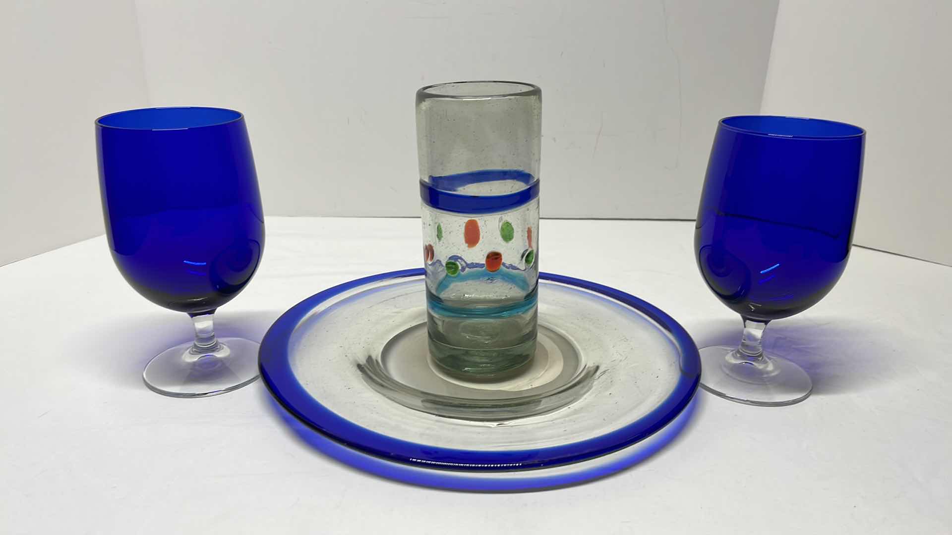 Photo 1 of CLEAR GLASS W COBALT BLUE 10.75” PLATE, 6.5” CUP, 6.25” WINE GLASSES