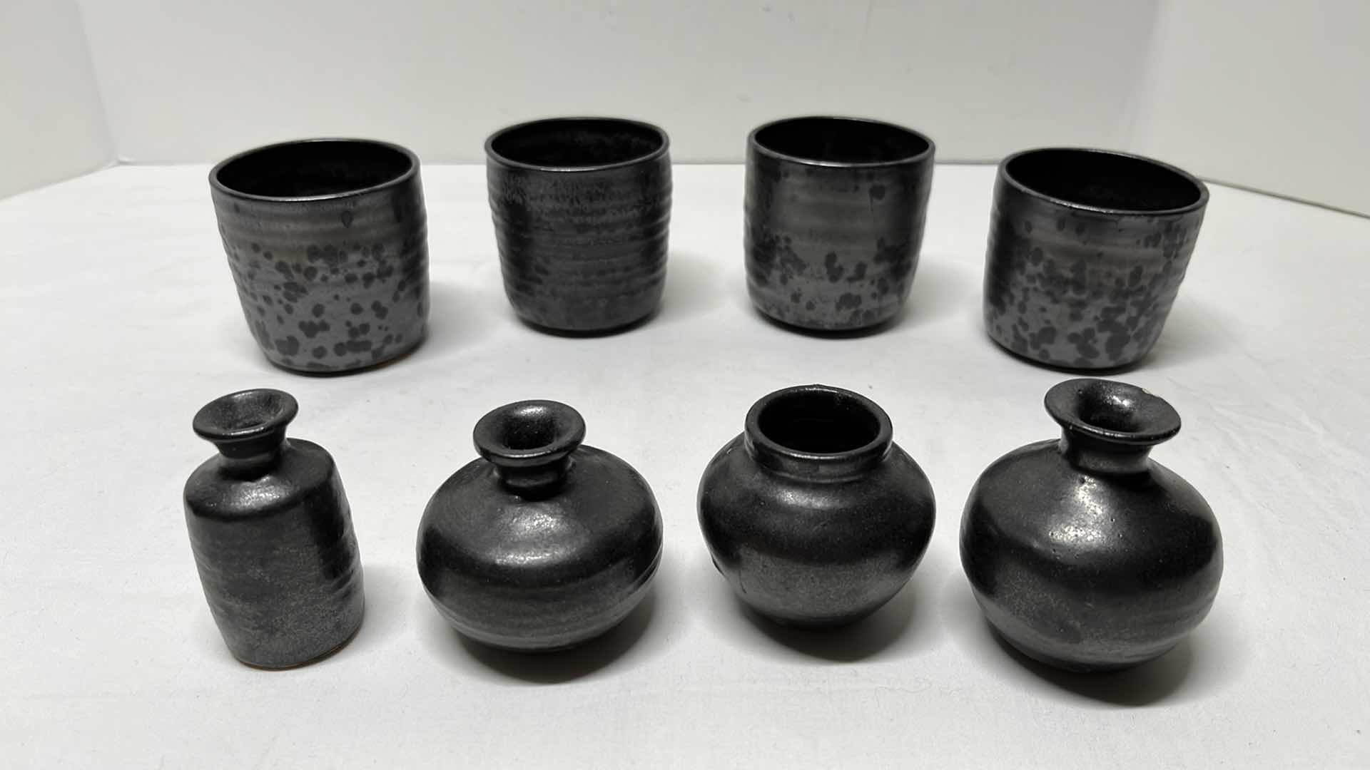 Photo 1 of CLAY 3”H GLASSES & CLAY POTTERY VASES 2.75”H (8 PCS)