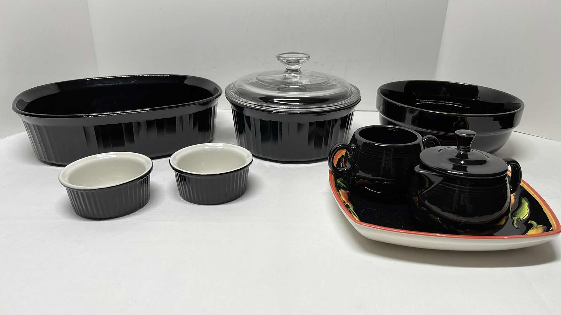 Photo 1 of 2 BLACK CORNING WARE DISHES, MIXING BOWL, 2 SMALL RAMEKINS, CREAM & SUGAR DISHES W BLACK CHILE PEPPER PLATE (9 PCS)