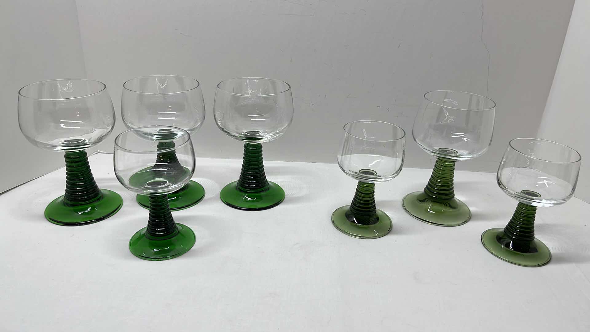 Photo 1 of ROEMER CLEAR GLASS W GREEN BEEHIVE STEM GLASS GOBLETS MADE IN GERMANY 7 PCS