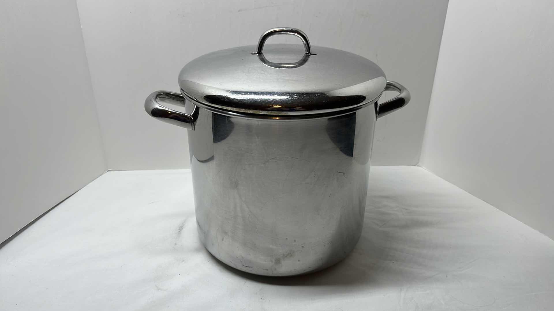 Photo 1 of REVERE WARE STAINLESS STEEL 12 QT COVERED STOCK POT 10” X 9.25”H (#2072)