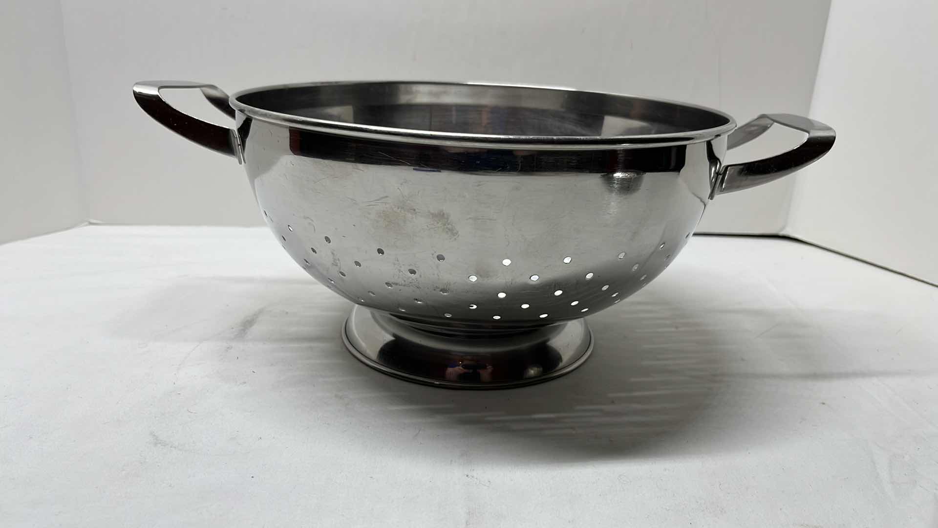 Photo 2 of SHARDA STAINLESS STEEL COLANDER W HANDLES 10” X 5.25”H & STAINLESS STEEL STEAMER BASKET  4.75”