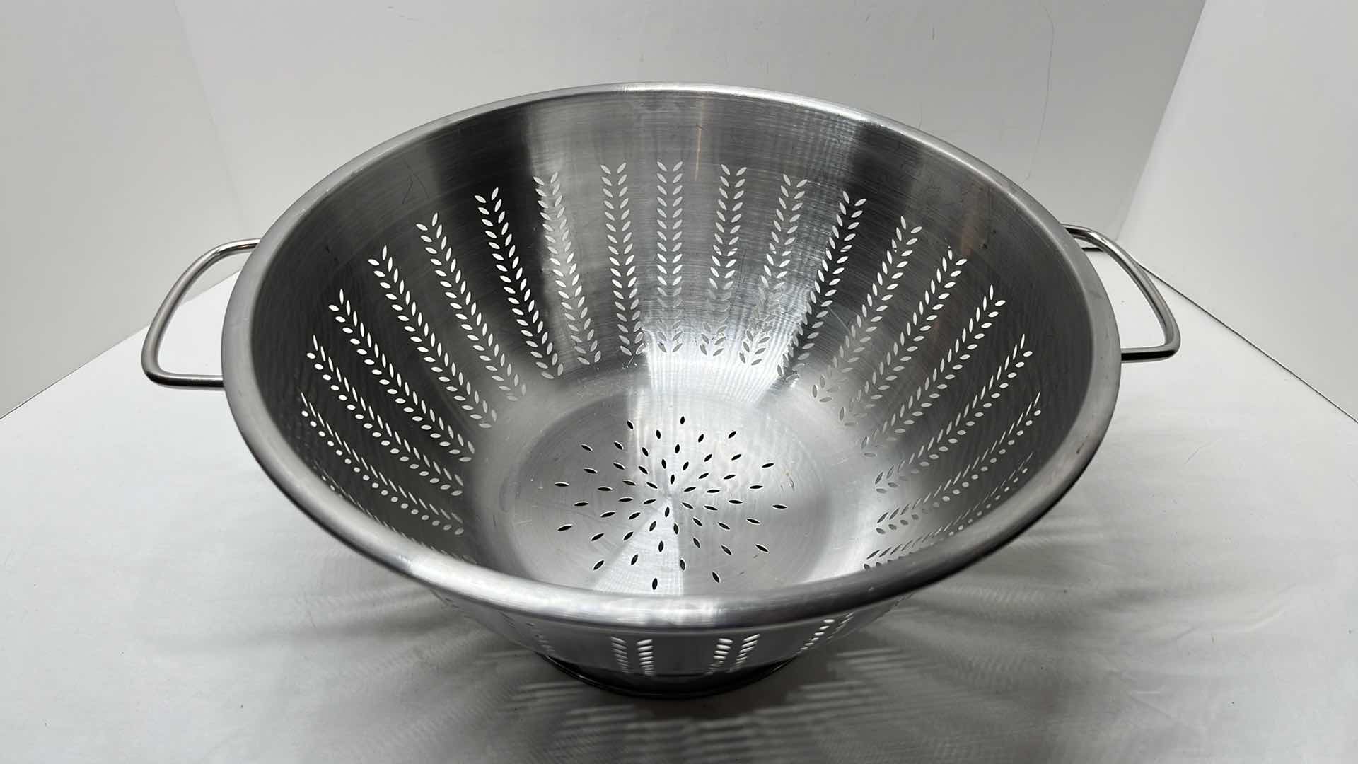 Photo 2 of STAINLESS STEEL COLANDER W HANDLES 13” X 6.75”H & STAINLESS STEEL STEAMER BASKET 6”