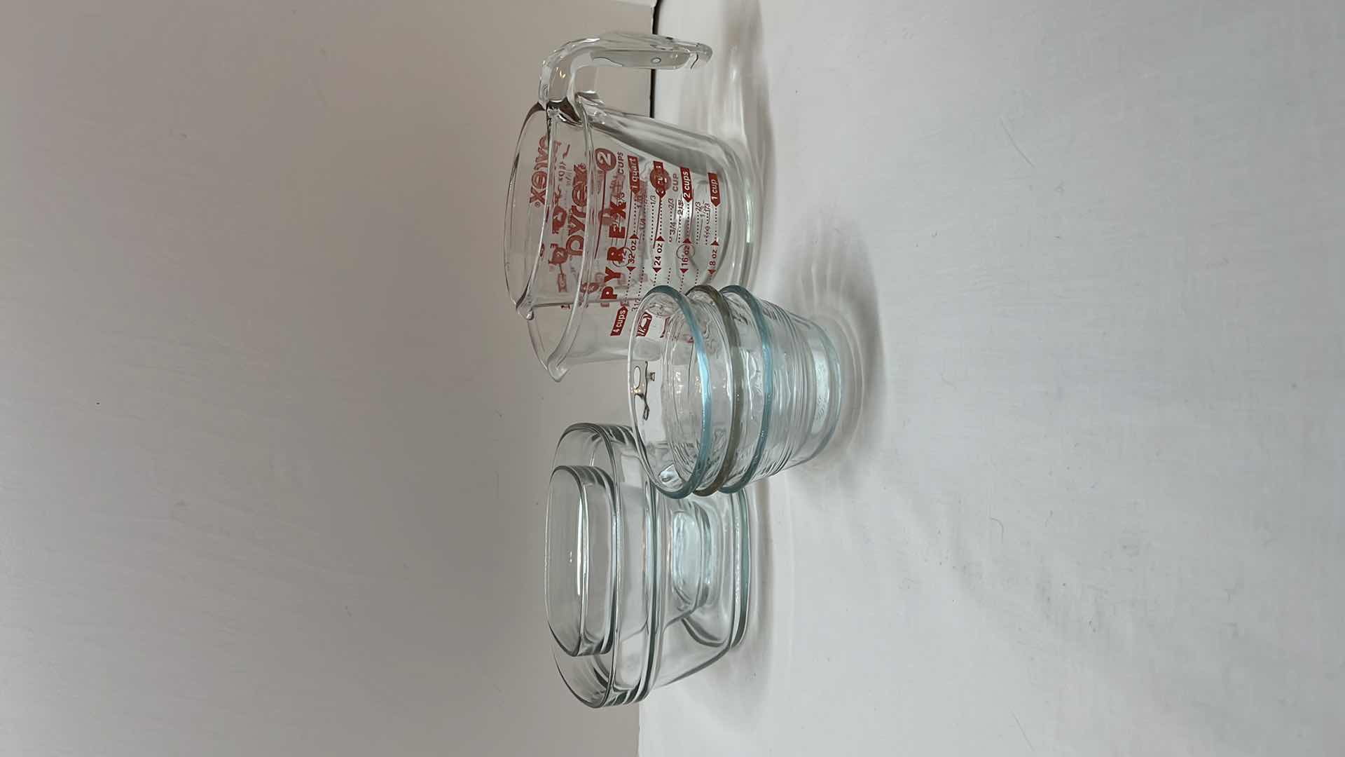 Photo 1 of PYREX GLASS MEASURING CUPS (2), 6 OZ MEASURING BOWLS (3) & RUBBERMAID GLASS SQUARE BOWLS (2)