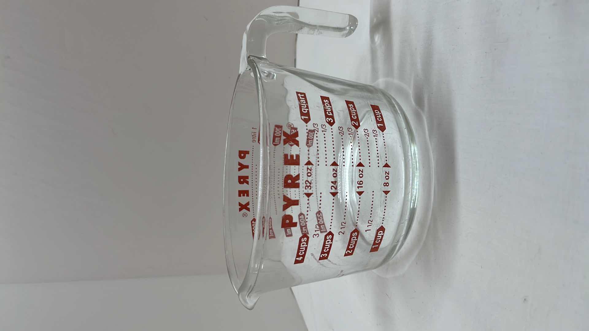 Photo 2 of PYREX GLASS MEASURING CUPS (2), 6 OZ MEASURING BOWLS (3) & RUBBERMAID GLASS SQUARE BOWLS (2)