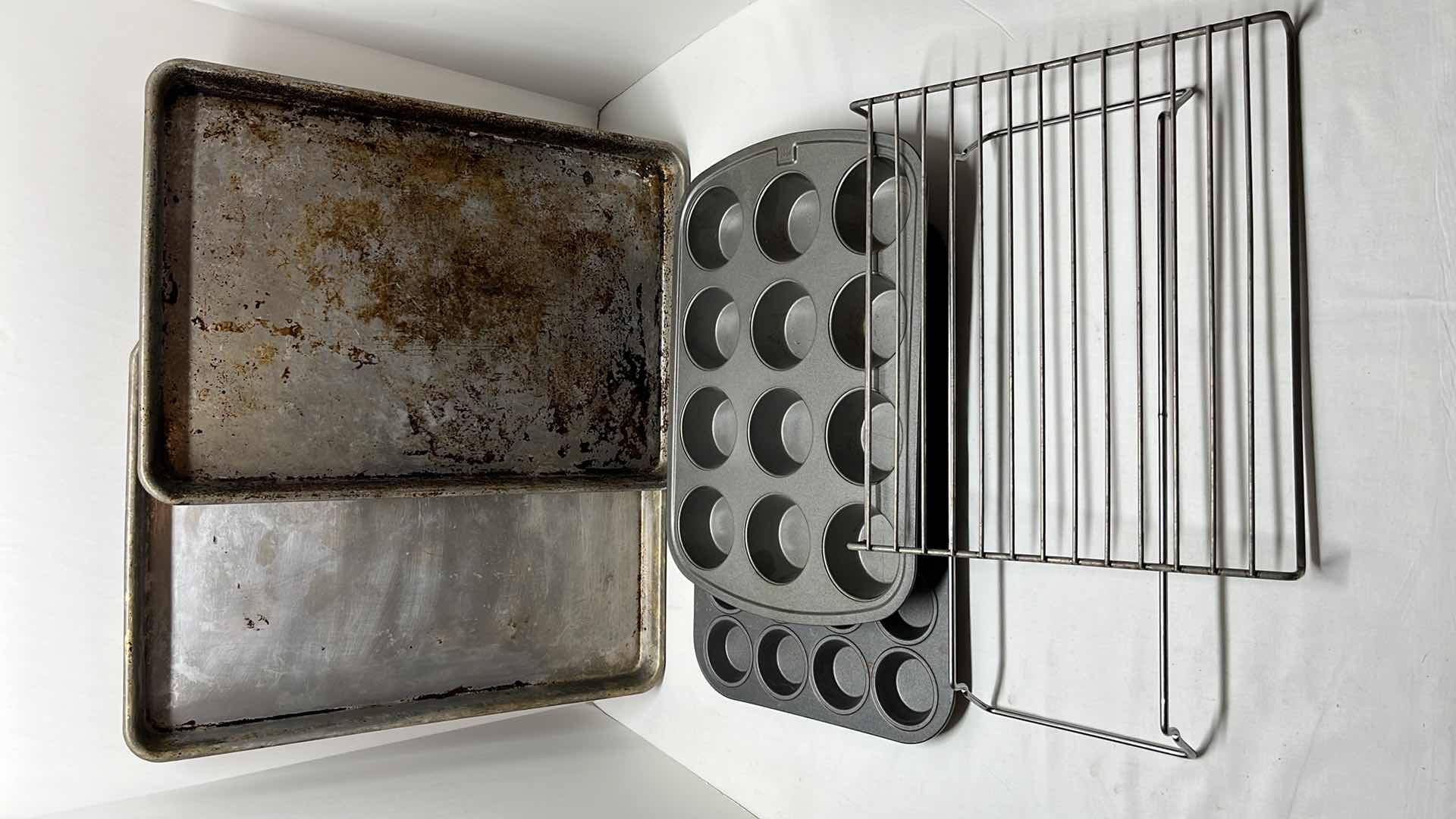 Photo 1 of COOKIE SHEETS 11.5” X 16.5 (2), MINI 24 CUPCAKE  BAKING PAN, 12 CUPCAKE BAKING PAN, COOLING RACKS (2)