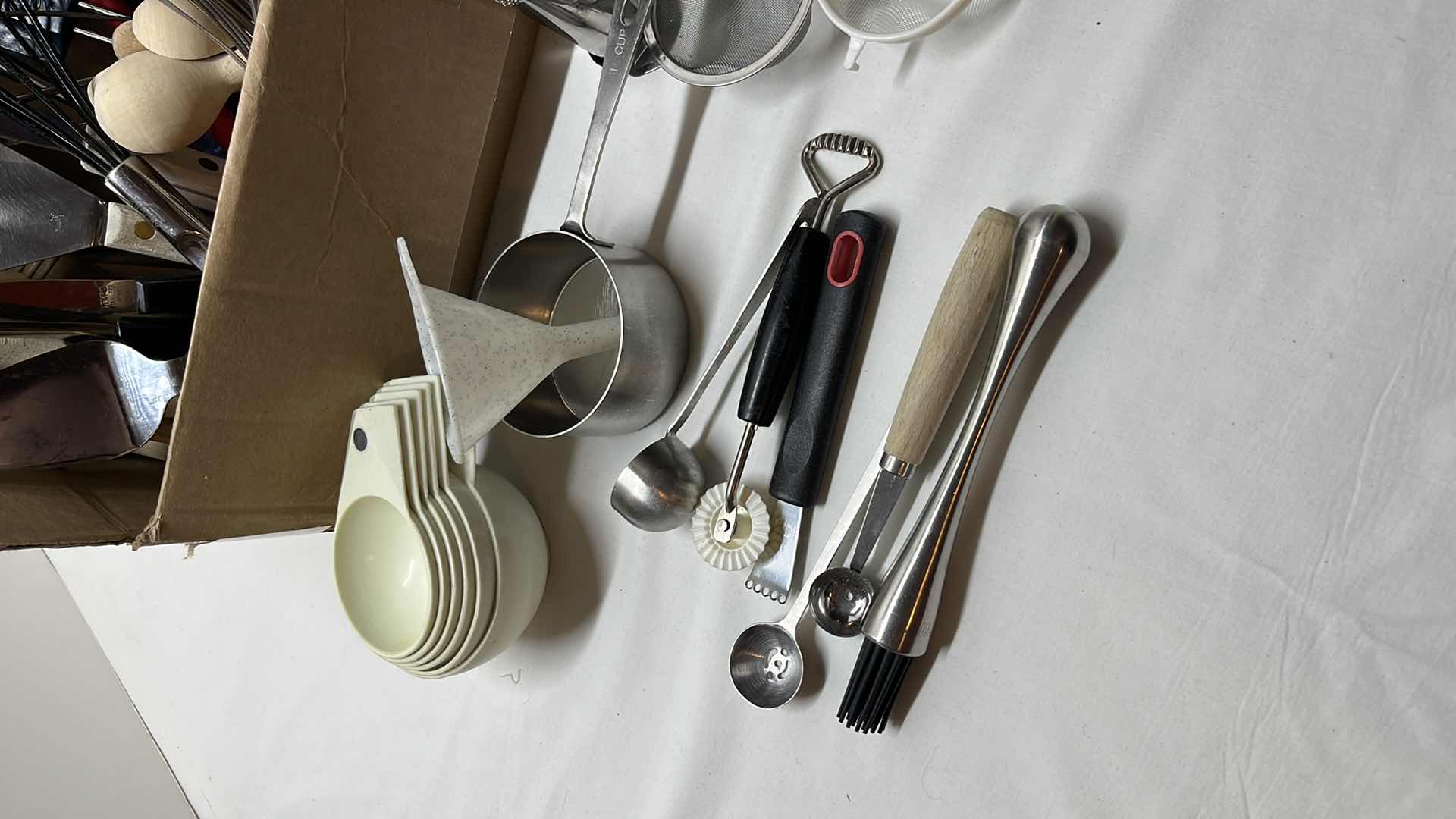 Photo 4 of WOODEN SPOONS, WHISPS, SPATULAS, PIE CUTTERS, MEASURING CUPS, STRAINERS AND MANY OTHER ITEMS