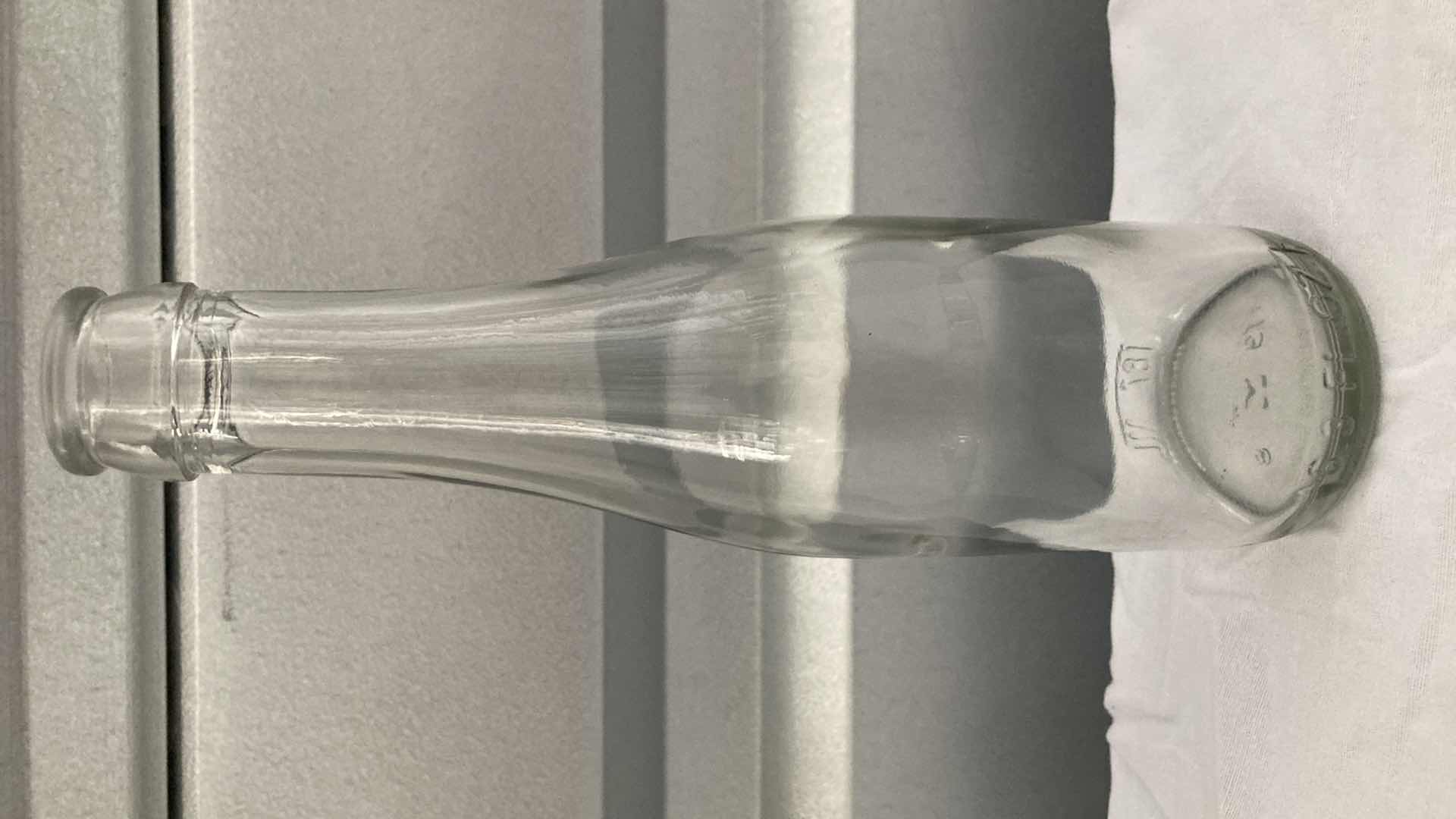 Photo 1 of CLEAR GLASS BOTTLE 6.3FL OZ (24)