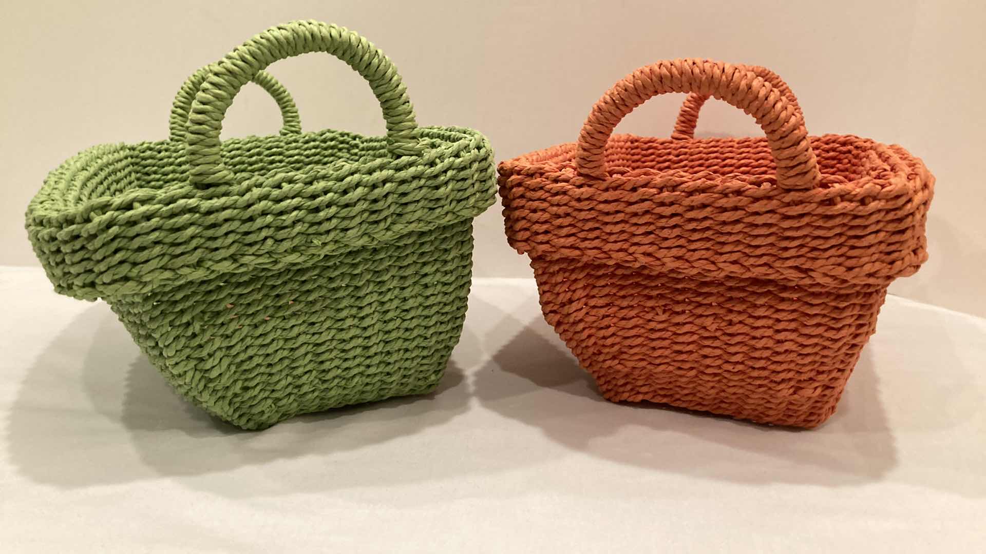 Photo 2 of WOVEN CLOTH GREEN & PINK BASKETS (2) 13” X 10” H6”