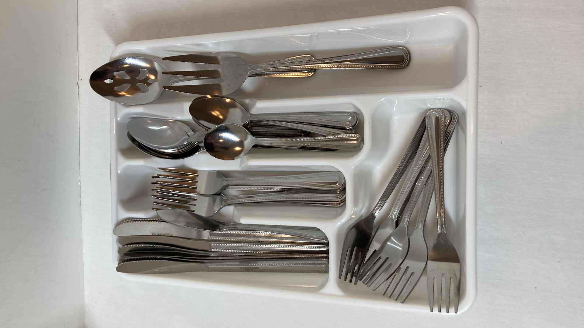 Photo 1 of GIBSON STAINLESS STEEL FLATWARE SET W HOLDER