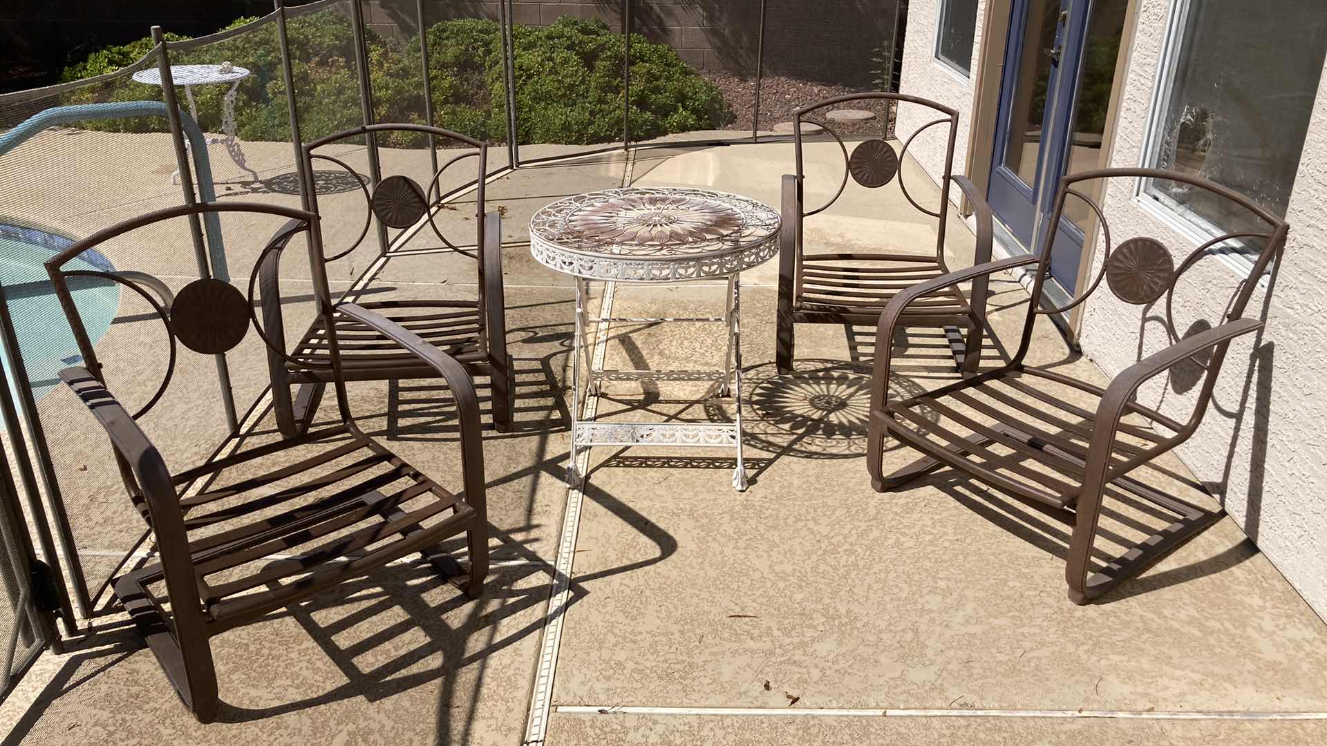 Photo 1 of FLORAL ACCENTED METAL PATIO TABLE 30” X 29” & CHAIRS (4) 28” X 30” H34”