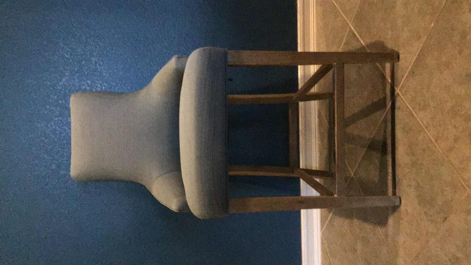 Photo 1 of RIVETED BLUE FABRIC AND WOOD LEGGED COUNTER/BARSTOOL 23” X 23” H43”