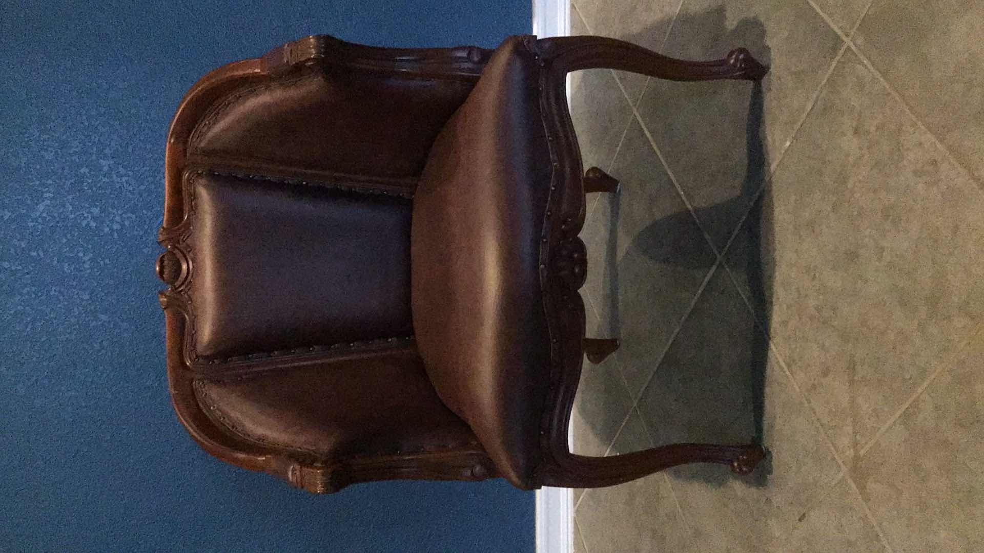 Photo 2 of CARVED WOOD AND LEATHER ARMCHAIR 29” X 28 H39”