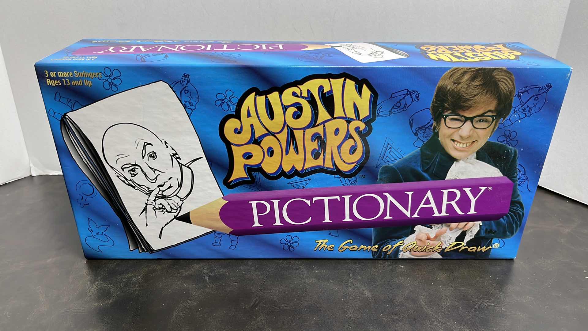 Photo 1 of USAOPOLY AUSTIN POWERS PICTIONARY GAME