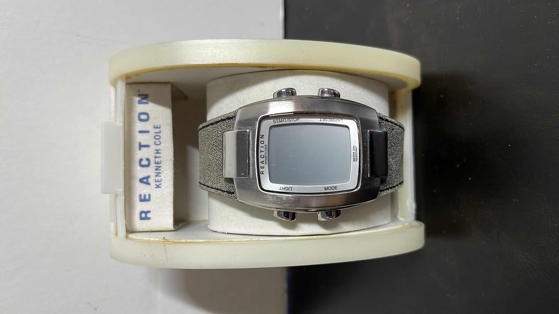 Photo 1 of MENS KENNETH COLE REACTION DIGITAL WATCH W GENUINE LEATHER STRAP IN CASE, MODEL V297-03 RK5046