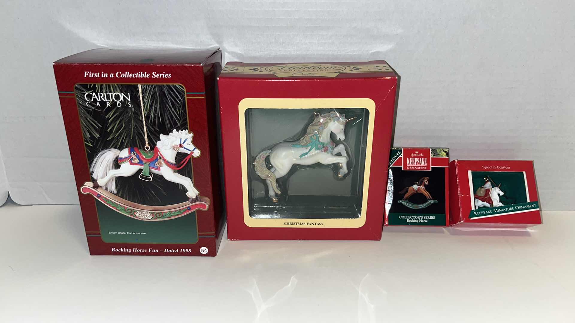 Photo 1 of CARLTON CARDS & HALLMARK KEEPSAKE COLLECTIBLE ROCKING HORSE & UNICORN CHRISTMAS ORNAMENTS (4)