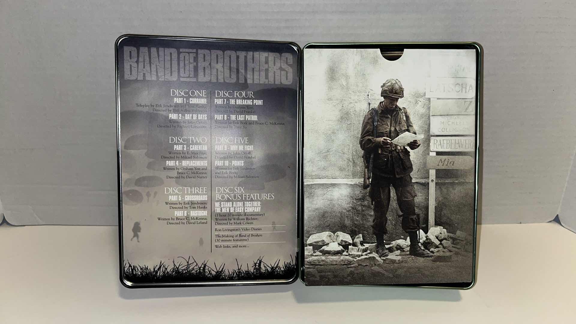 Photo 4 of BAND OF BROTHERS, COMPLETE HBO SERIES 6 DISC DVD BOX SET IN COLLECTIBLE TIN BOX , 2001