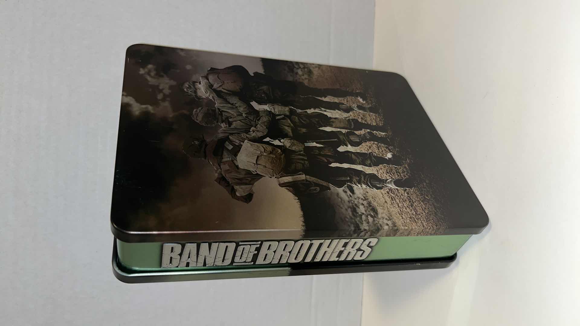 Photo 7 of BAND OF BROTHERS, COMPLETE HBO SERIES 6 DISC DVD BOX SET IN COLLECTIBLE TIN BOX , 2001