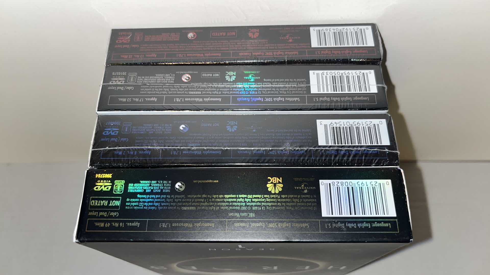 Photo 4 of HEROES SEASONS 1-4 DVD BOX SETS (4)