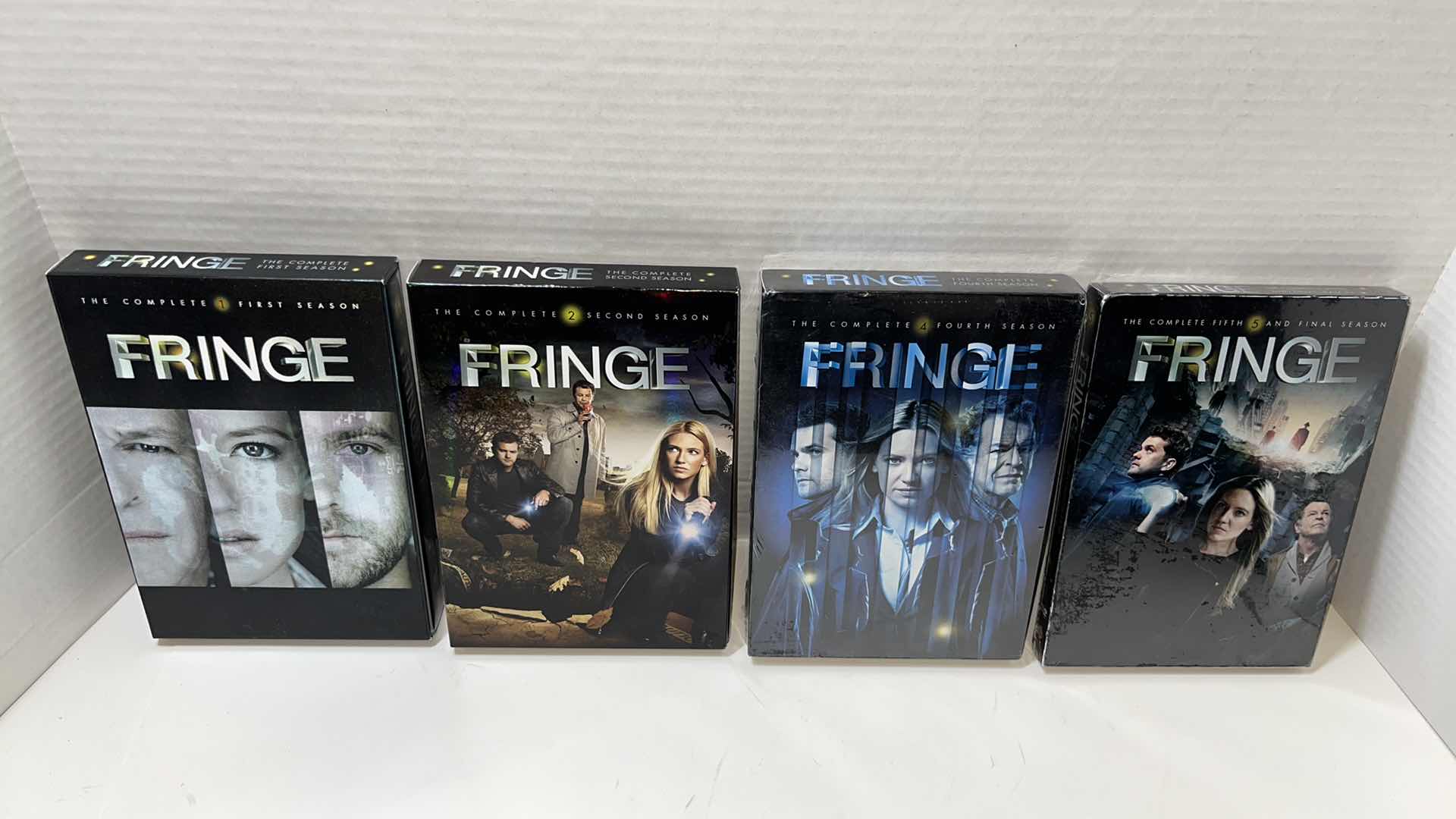 Photo 1 of FRINGE SEASONS 1, 2, 4, & 5 DVD BOX SETS (4)