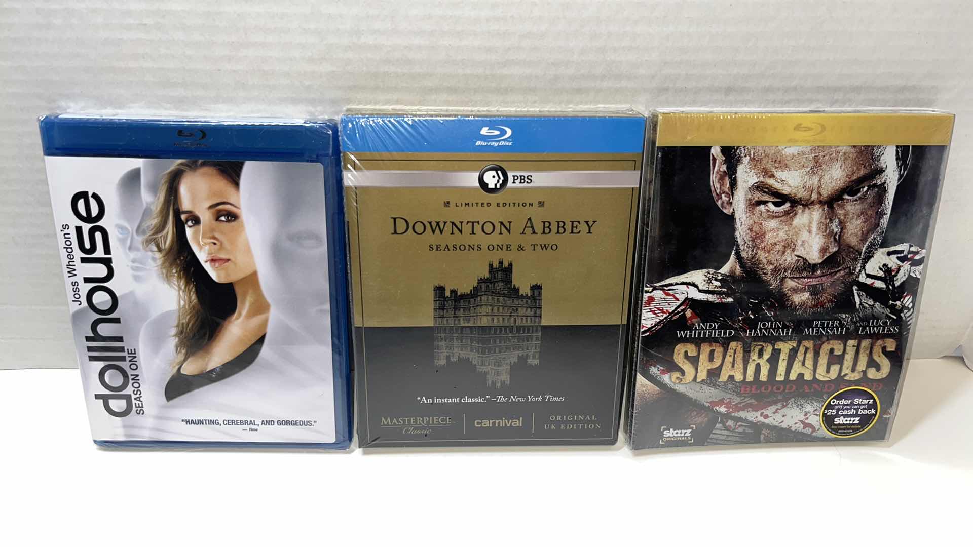 Photo 1 of NEW DOLLHOUSE SEASON ONE, DOWNTON ABBEY SEASONS 1 & 2, SPARTACUS BLOOD AND SAND BLU-RAY MOVIES (3)