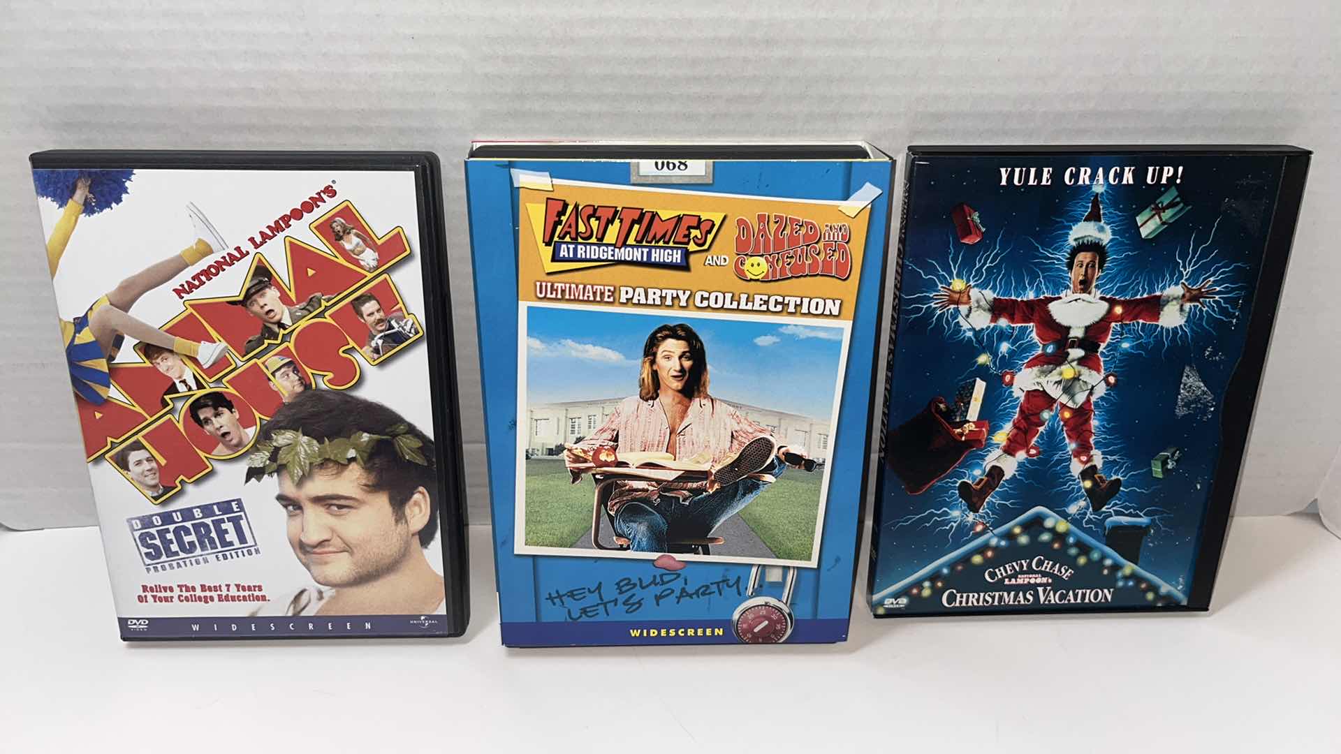 Photo 1 of NATIONAL LAMPOONS ANIMAL HOUSE, FAST TIMES AT RIDGEMONT HIGH/ DAZED AND CONFUSED ULTIMATE PARTY COLLECTION & NATIONAL LAMPOONS CHRISTMAS VACATION DVD MOVIES (3)