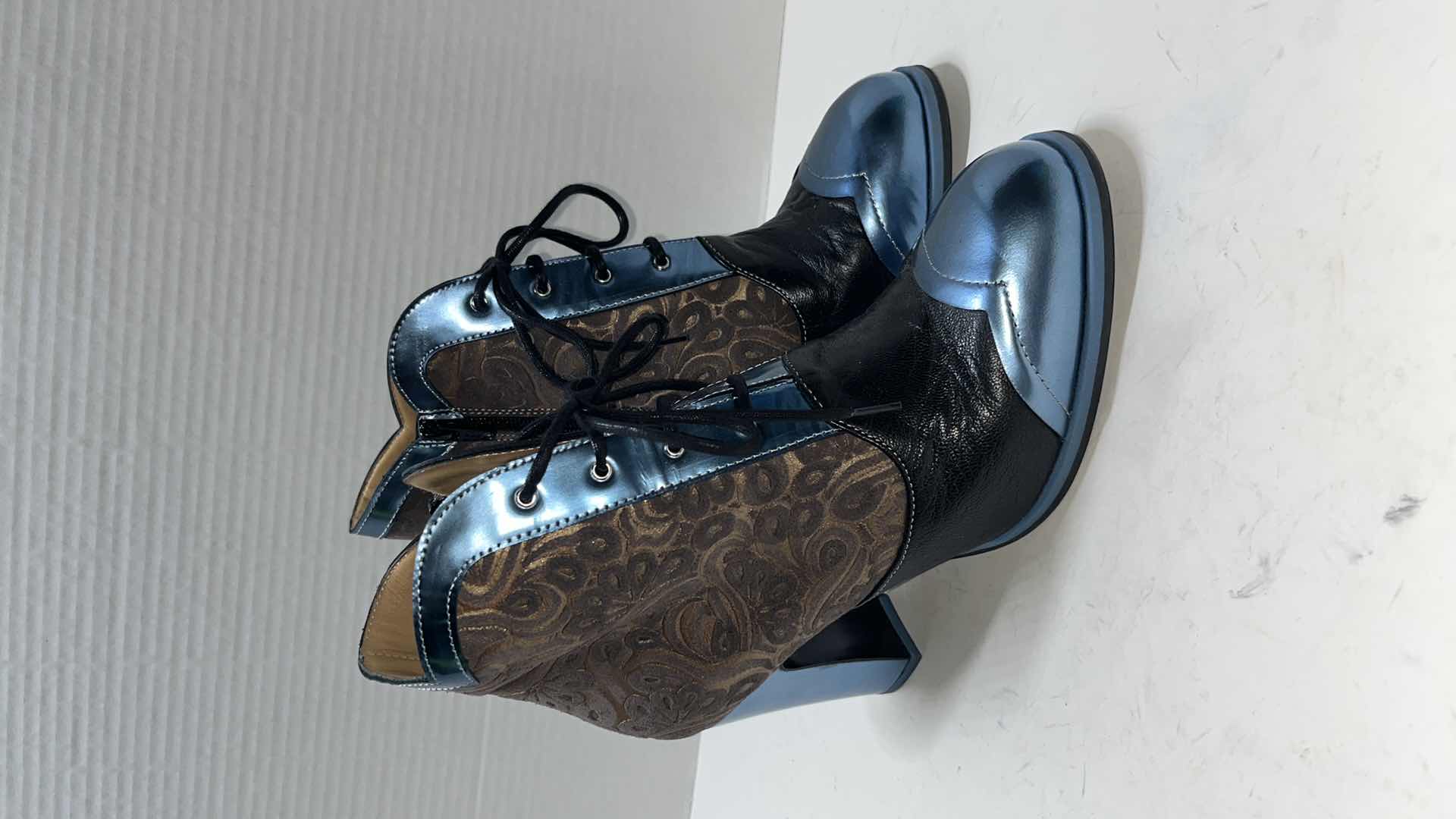 Photo 1 of JOHN FLUEVOG CARMEN EMBOSSED BOOT W STORAGE BAG, METALLIC BLUE/GOLD/BLACK (WOMENS SIZE 8.5)