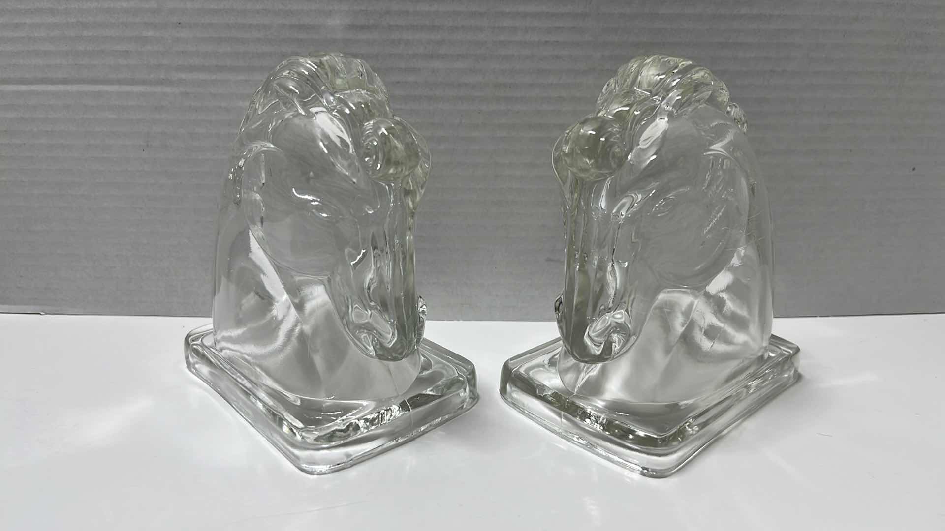 Photo 1 of VINTAGE MIDCENTURY CLEAR GLASS HORSE HEAD BOOKENDS, 3.25” X 4.75” H5.5” (2)