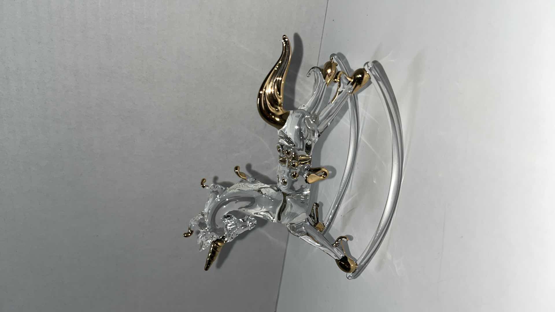 Photo 3 of HAND BLOWN CLEAR GLASS ROCKING UNICORN W GOLD ACCENTS 4.75” X 2” H4”W CRYSTAL ROCKING HORSE W GOLD ACCENTS (2)
