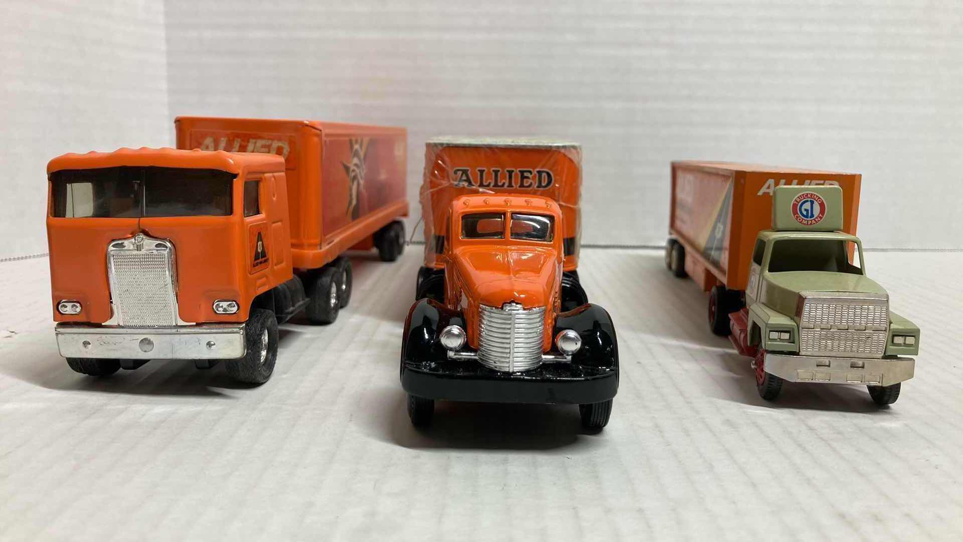 Photo 2 of ERTL ALLIED MOVE TO FREEDOM & ALLIED VAN LINES NATION WIDE MOVING SEMI-TRUCKS W WINROSS  ALLIED SPECIAL PRODUCTS DIV. SEMI-TRUCK TOY MODELS