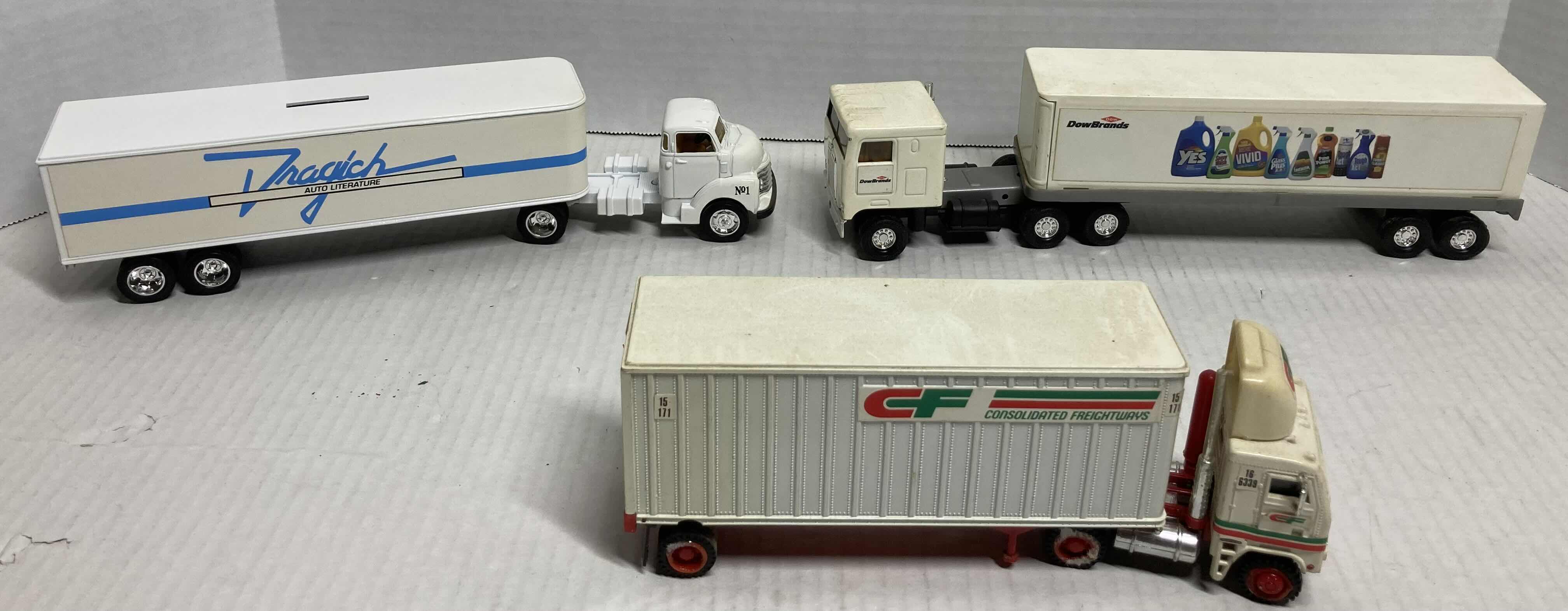 Photo 1 of ERTL AUTO LITERATURE & DOW BRANDS SEMI-TRUCKS W 
TONKIN CF CONSOLIDATED FREIGHTWAYS SEMI-TRUCK MODEL TRUCKS