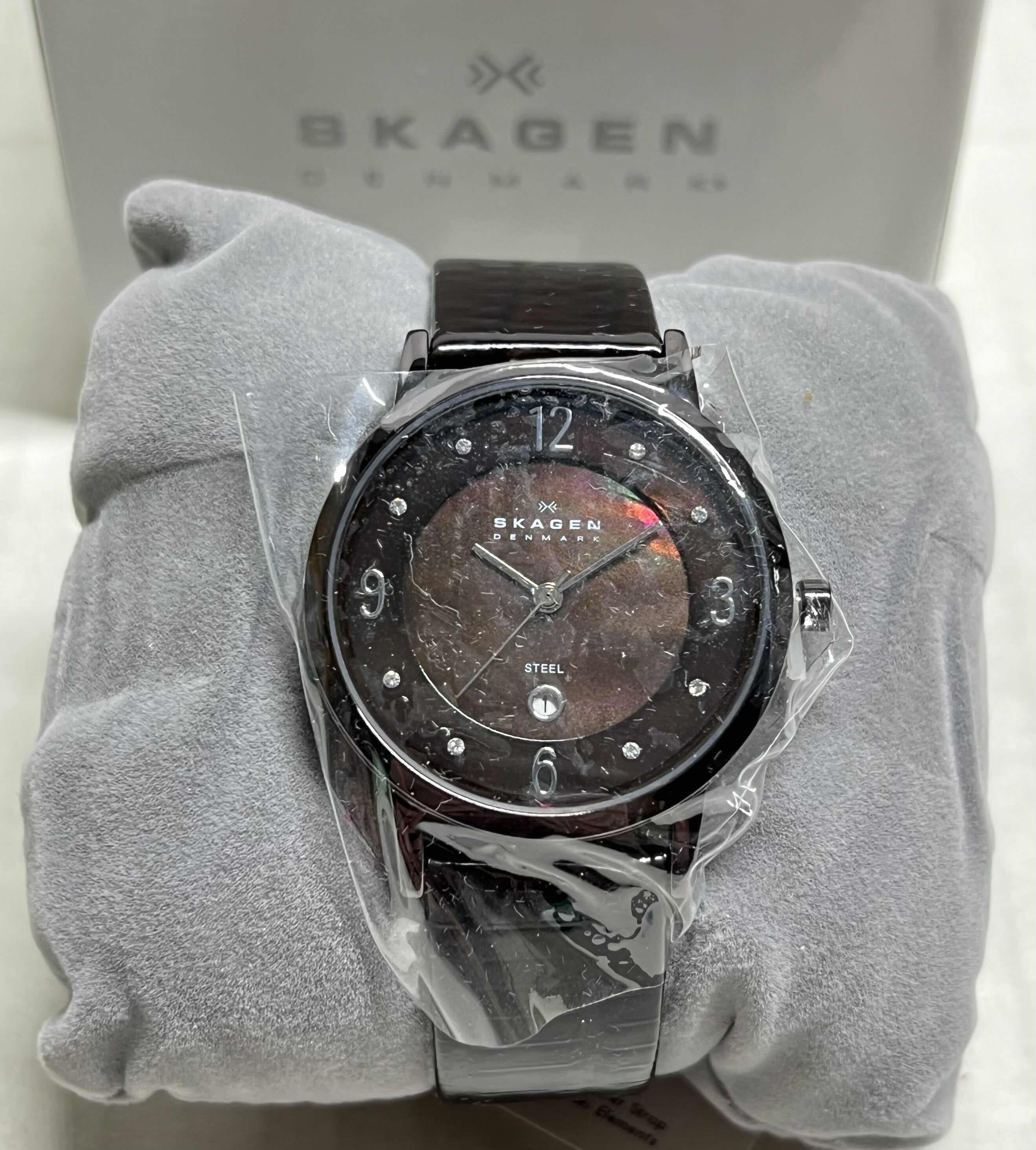 Photo 1 of SKAGEN STEEL WOMENS ANALOG WATCH W STAINLESS STEEL CASE & GENUINE LEATHER STRAP PURPLE MOTHER OF PEARL INLAY W SWAROVSKI CRYSTALS MODEL 574SDLD8A