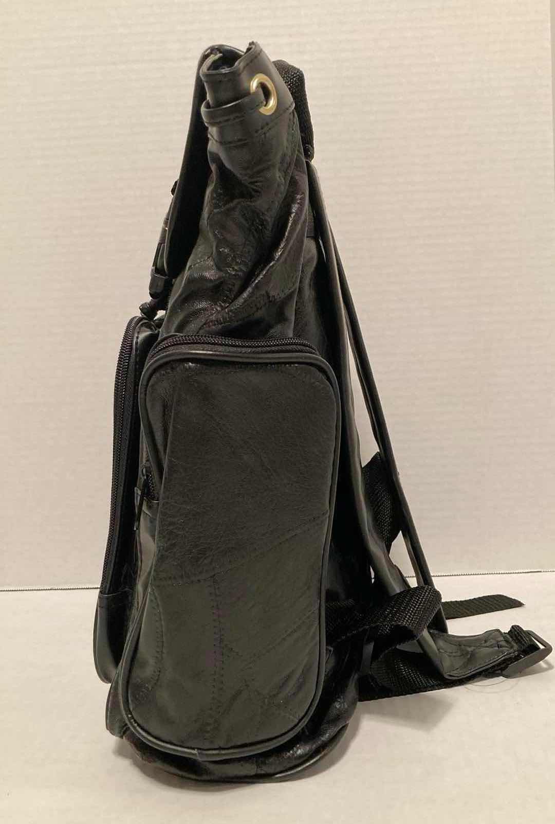 Photo 3 of EMBASSY BLACK GENUINE BUTTERY SOFT LEATHER BACKPACK 12” X 14.75”