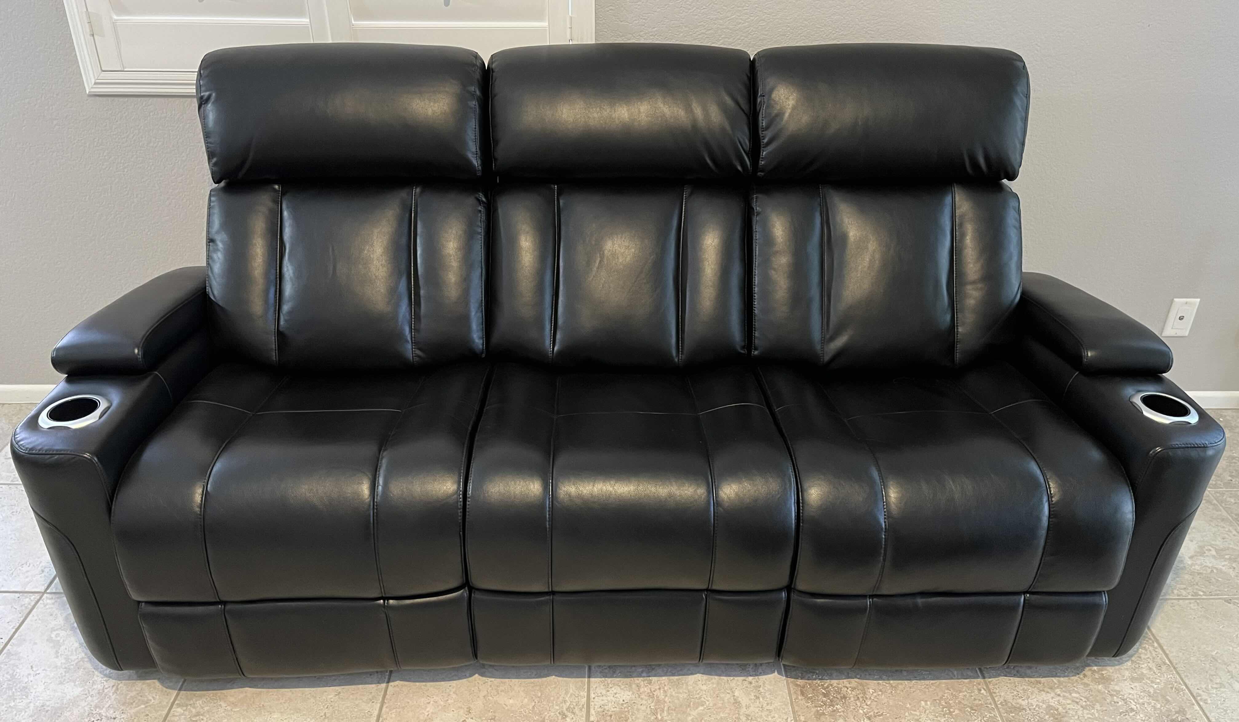 Photo 1 of ZHEJIANG HOME POINT FURNITURE CO BLACK LEATHER POWERED DUAL RECLINING SOFA 85” X 40” H41.5” (READ NOTES)