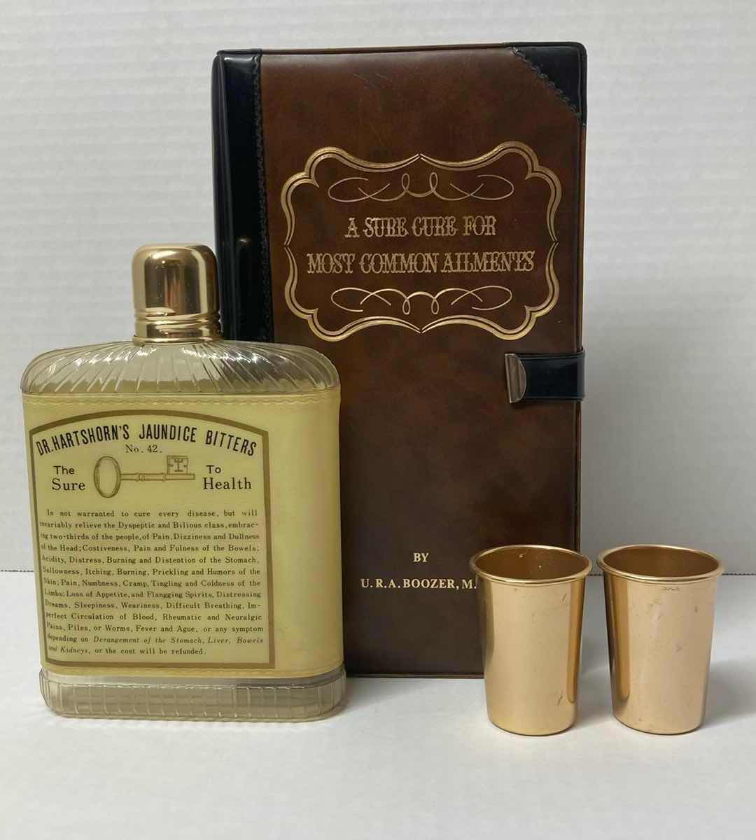 Photo 3 of U.R.A. BOOZER M.D. NOVELTY BOOK BAR FLASK “ A SURE CURE FOR MOST COMMON AILMENTS”