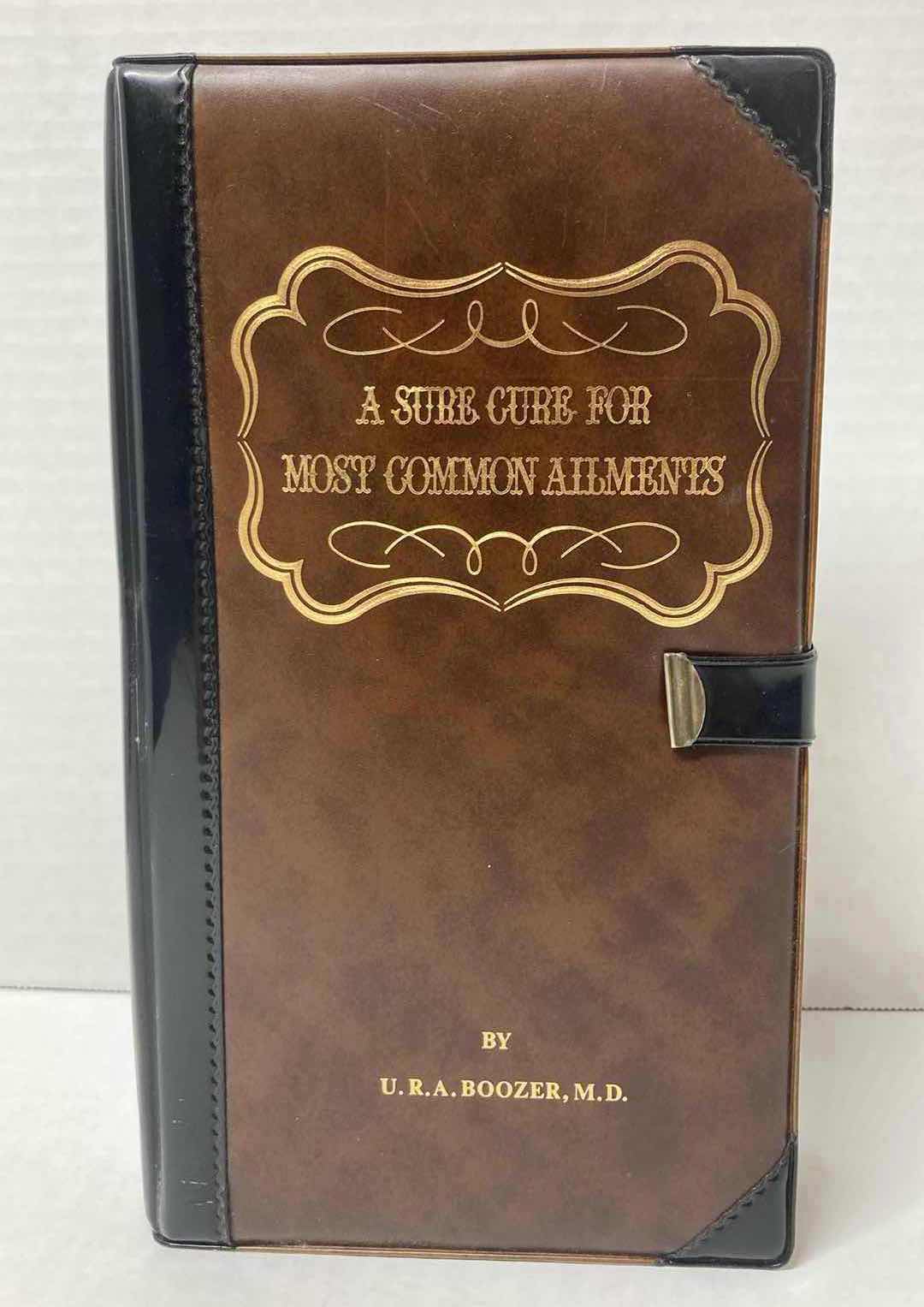 Photo 1 of U.R.A. BOOZER M.D. NOVELTY BOOK BAR FLASK “ A SURE CURE FOR MOST COMMON AILMENTS”
